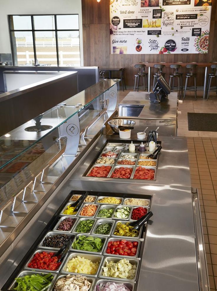 the food is prepared and ready to be served at the restaurant or diner's counter