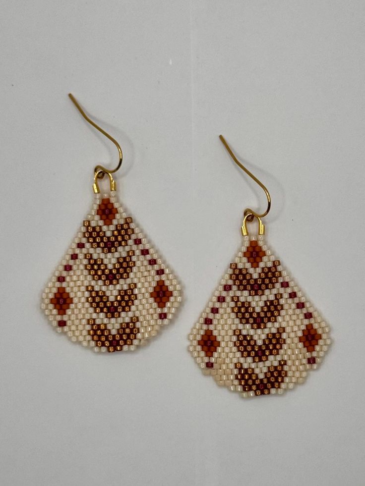 Hand beaded earrings made in my small studio at the foothills of the Sierra mountains.  These earrings are created by sewing glass seed beads with ultra-strong thread. Plated gold French style earring wires complete the design.  Other metal options are available for metal-sensitive skin- message me! Other color arrangements are available- message me!   Pattern credit to Snails & Fairy Dust Hand Beaded Earrings, Sierra Mountains, Style Français, Earring Wires, Falling Leaves, Small Studio, Fairy Dust, Hand Beading, French Style