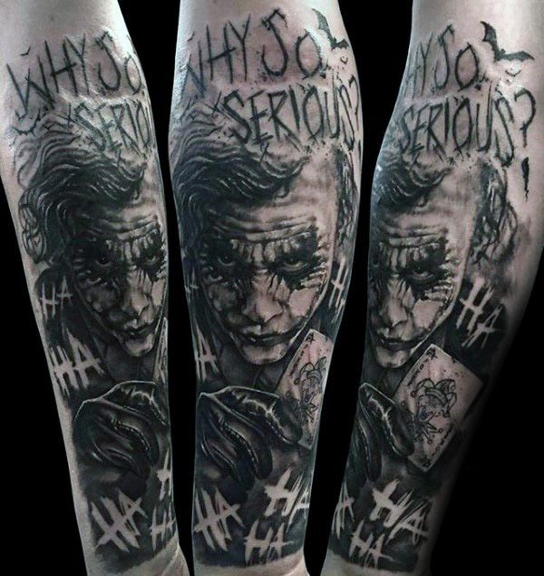 the joker tattoo is shown on both legs and leg sleeves, with words written in black ink