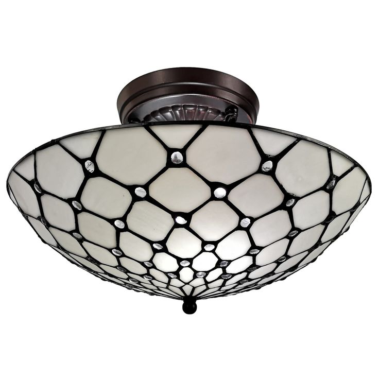 a light fixture with a white and black pattern on the glass shade, hanging from a ceiling