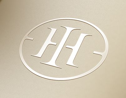 a laptop with the h logo on it