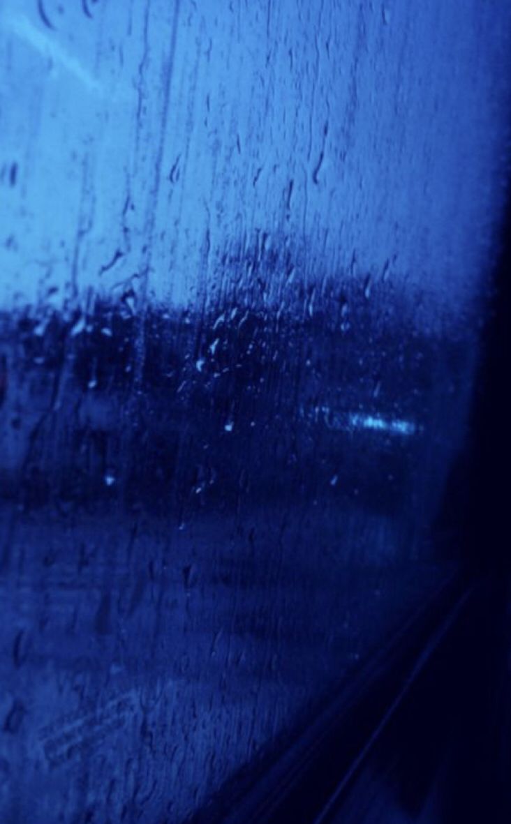 rain drops on the window of a train