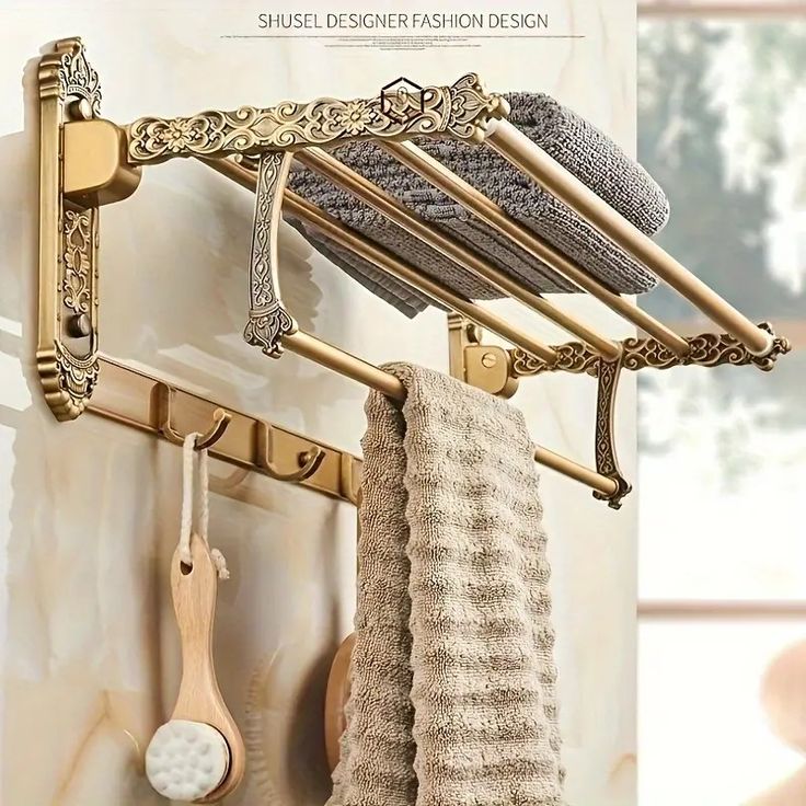 there is a towel rack on the wall with towels hanging from it's hooks