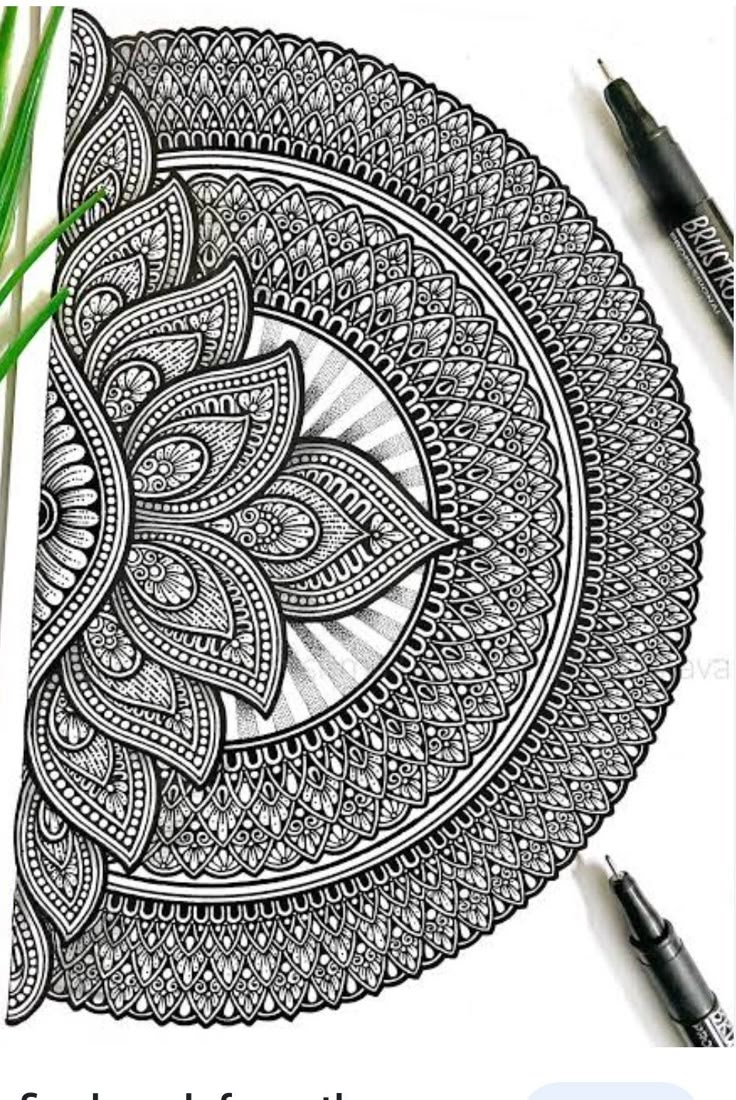 an intricate coloring page with markers and pens