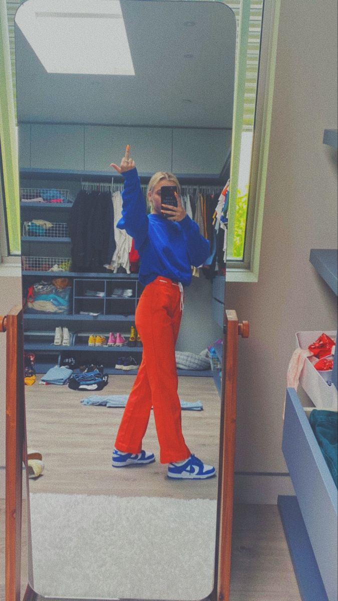 Orange Trousers Outfit, Orange And Blue Outfit, Blue Cargo Pants Outfit, Red Trousers Outfit, Orange Pants Outfit, Bright Blue Jeans, 30th Birthday Outfit, Royal Blue Outfits, Varsity Jacket Outfit