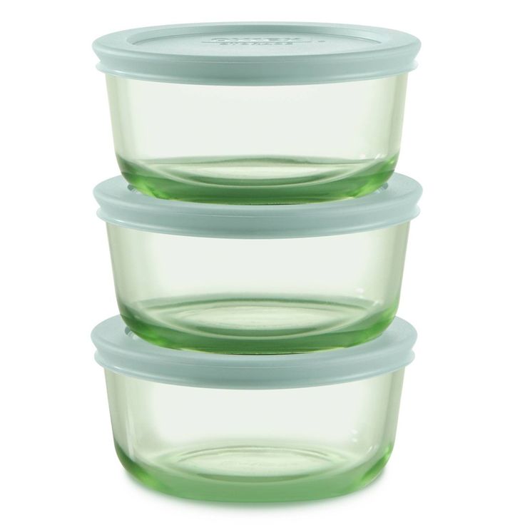 three glass containers stacked on top of each other