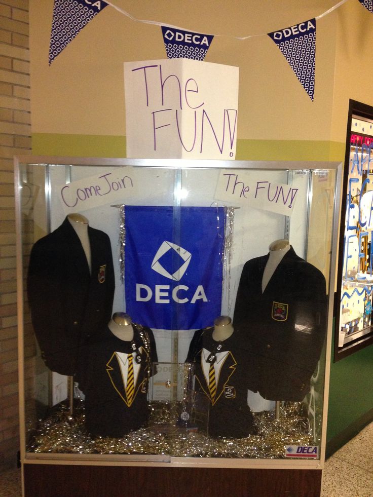 a display case filled with different types of jackets and hats in front of a sign that says the fun come to the fun