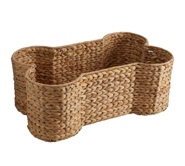 a woven basket with three sections on the bottom and one section in the middle, is shown