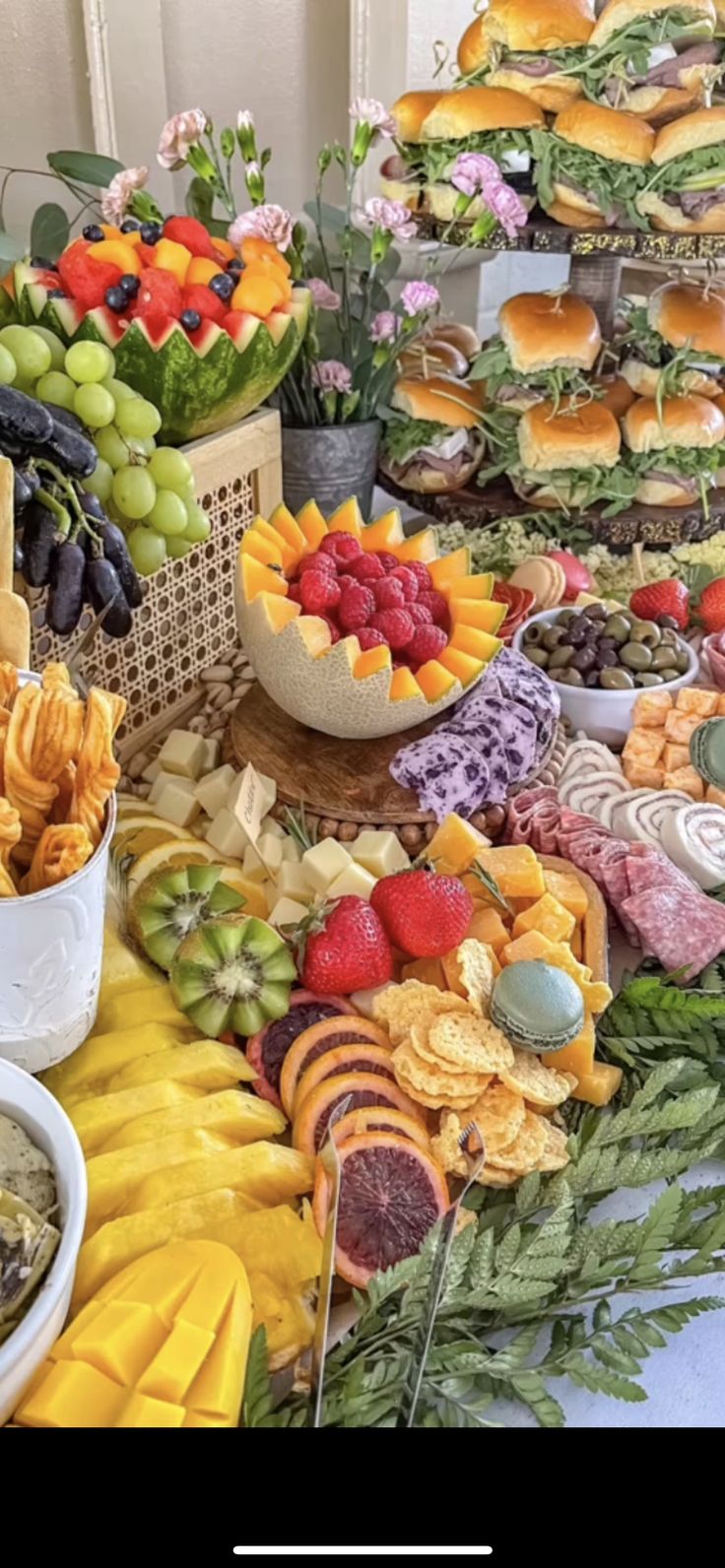 a table filled with lots of different types of food