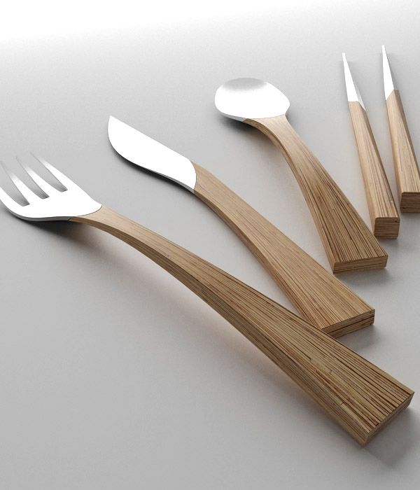 five wooden utensils and spoons on a table