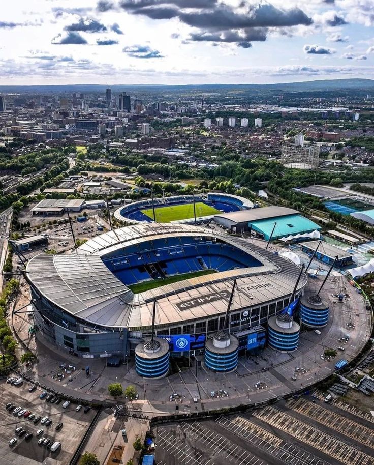 an aerial view of the stadium and surrounding buildings