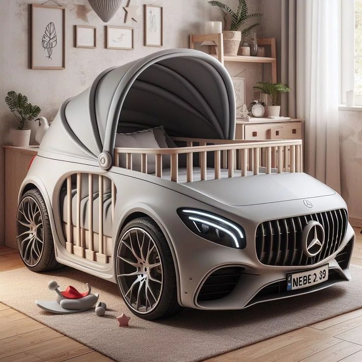 a car shaped bed is in the middle of a room with a baby's crib