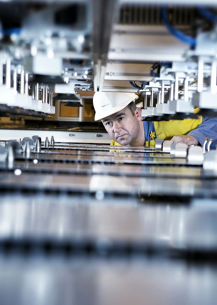 Male engineer inspects machinery Machinery Photography, Industrial Pictures, Industrial Portrait, Manufacturing Photography, Engineering Photography, Industry Photography, Machine Photography, Factory Photography, Steel Factory