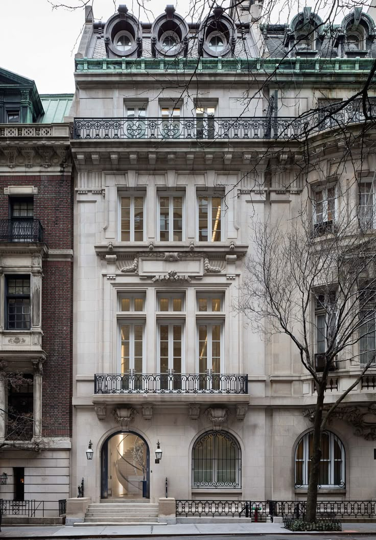 an old building with many windows and balconies