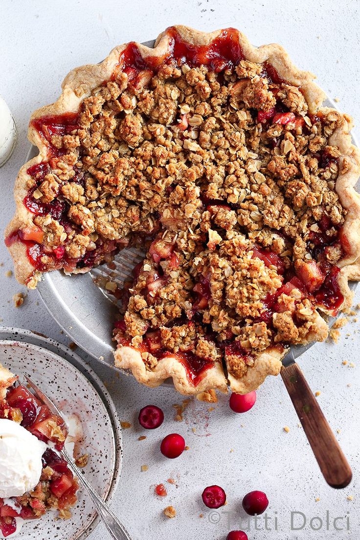 a pie with cranberry topping on top