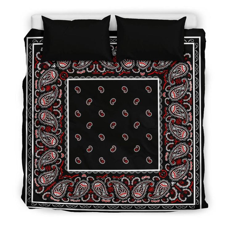 a black and red bandanna with paisley designs on the bottom, in front of a white background