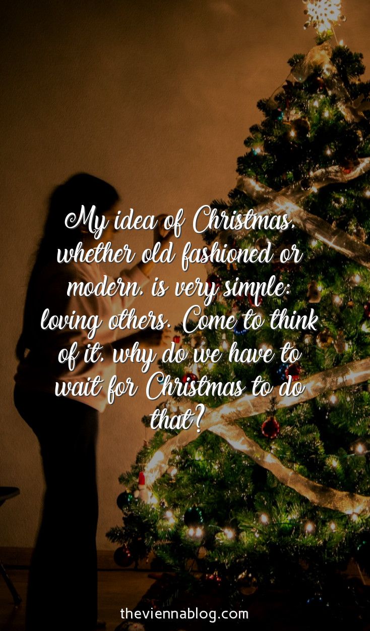 a woman standing in front of a christmas tree with the words, my idea of christmas whether old fashioned or modern is very simple