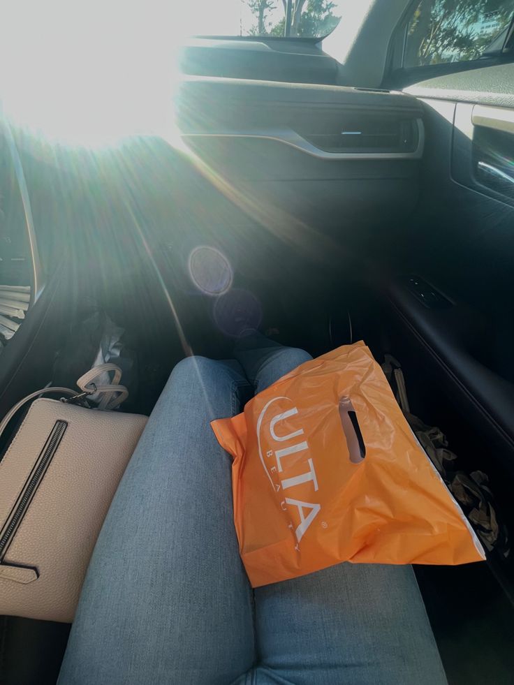 a bag sitting on the back seat of a car