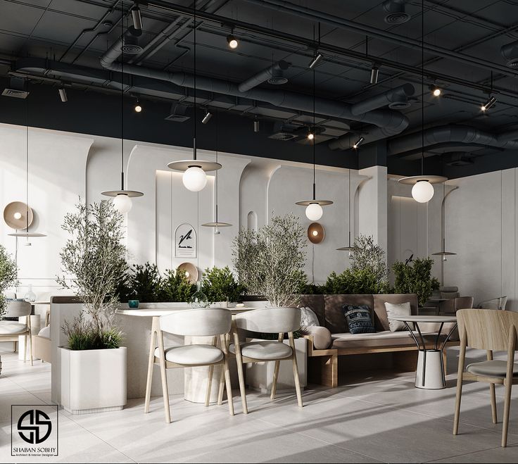 a room filled with lots of white furniture and potted plants on the wall next to tables