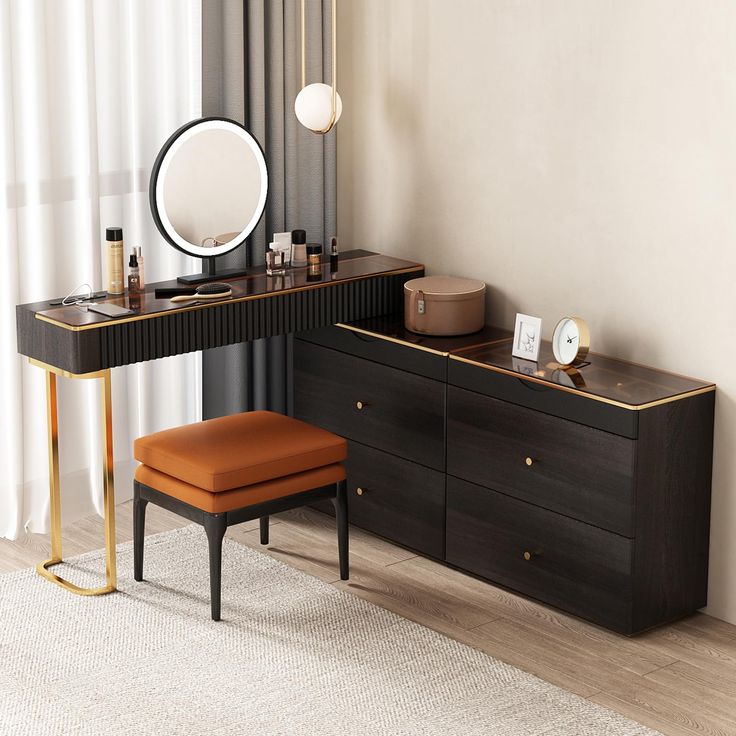 a desk with a mirror, stool and other items on it