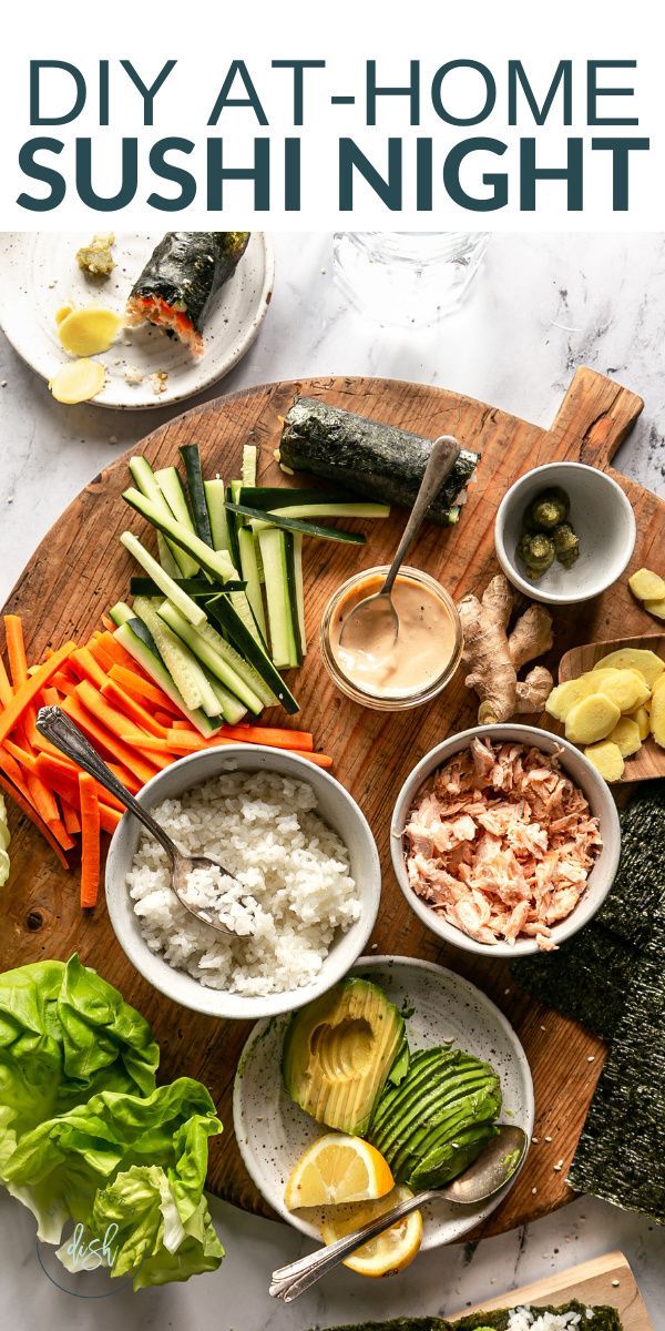 sushi platter with vegetables, rice and sauces on the side text overlay reads diy at home sushi night