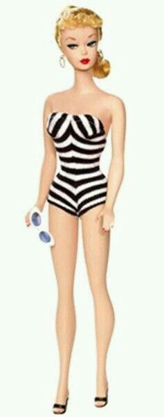 a barbie doll wearing a black and white striped swimsuit