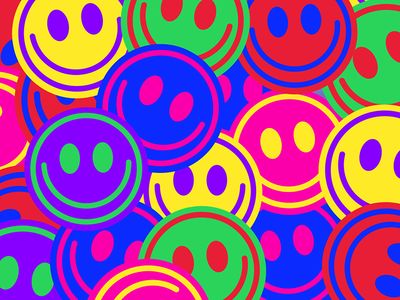 an image of colorful smiley faces in the middle of a circle with circles around it