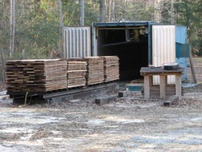 there is a truck that has some wood in it