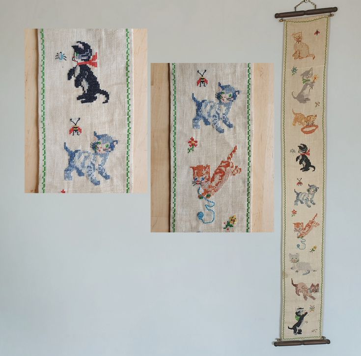 three wall hangings decorated with cats and dogs on white fabric, each featuring an animal motif