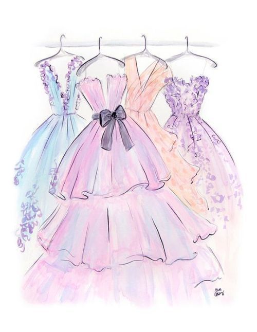 three dresses hanging on a clothes rack with ribbons around the neck and bows at the waist