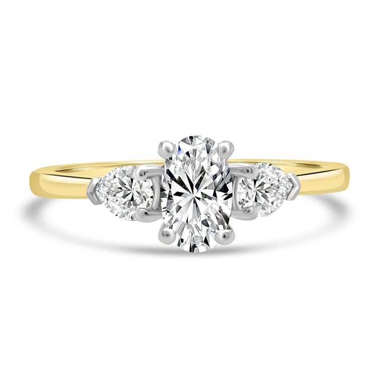 a yellow and white gold engagement ring with three stones