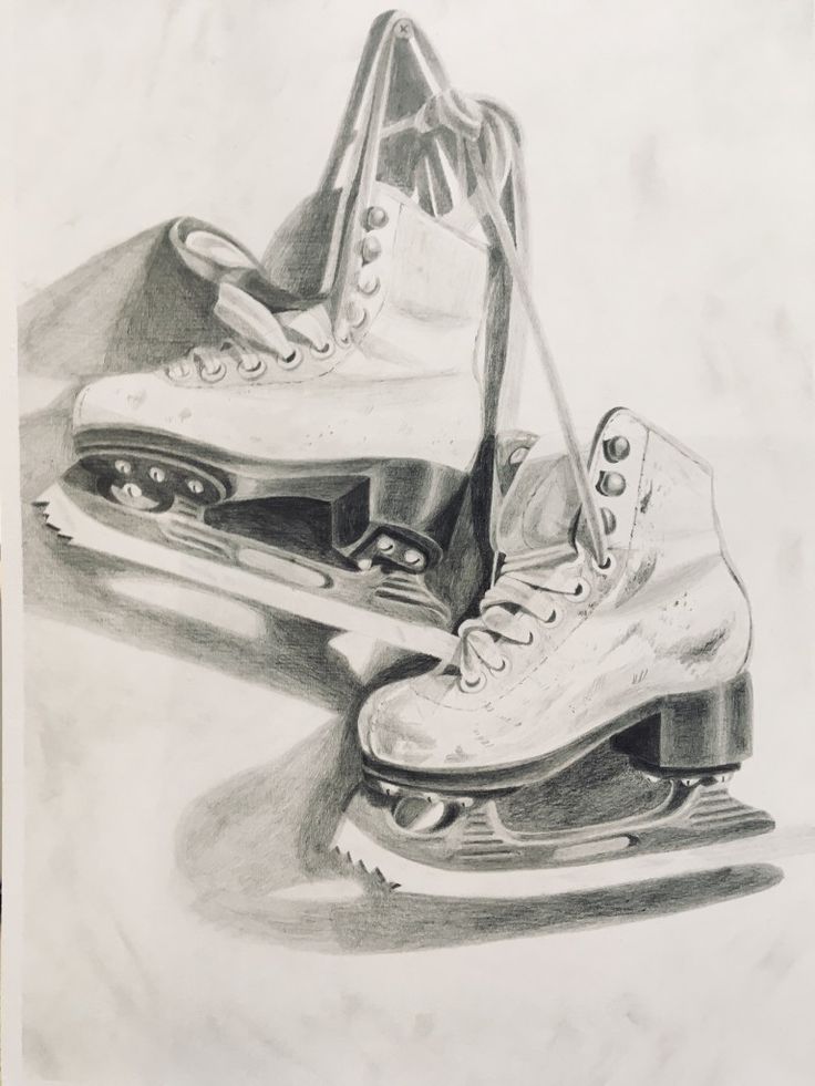 a drawing of two ice skates with one being on the ground