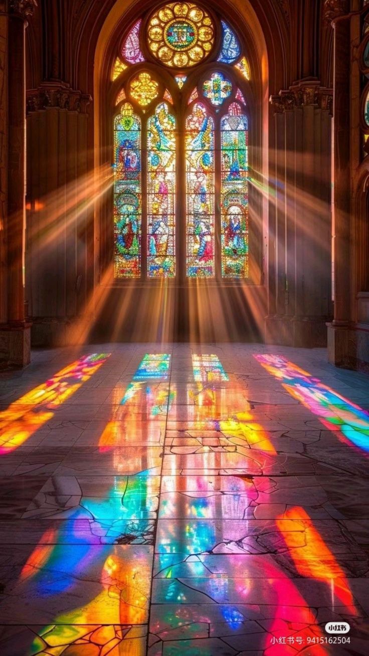 sunlight streaming through the stained glass windows in a cathedral