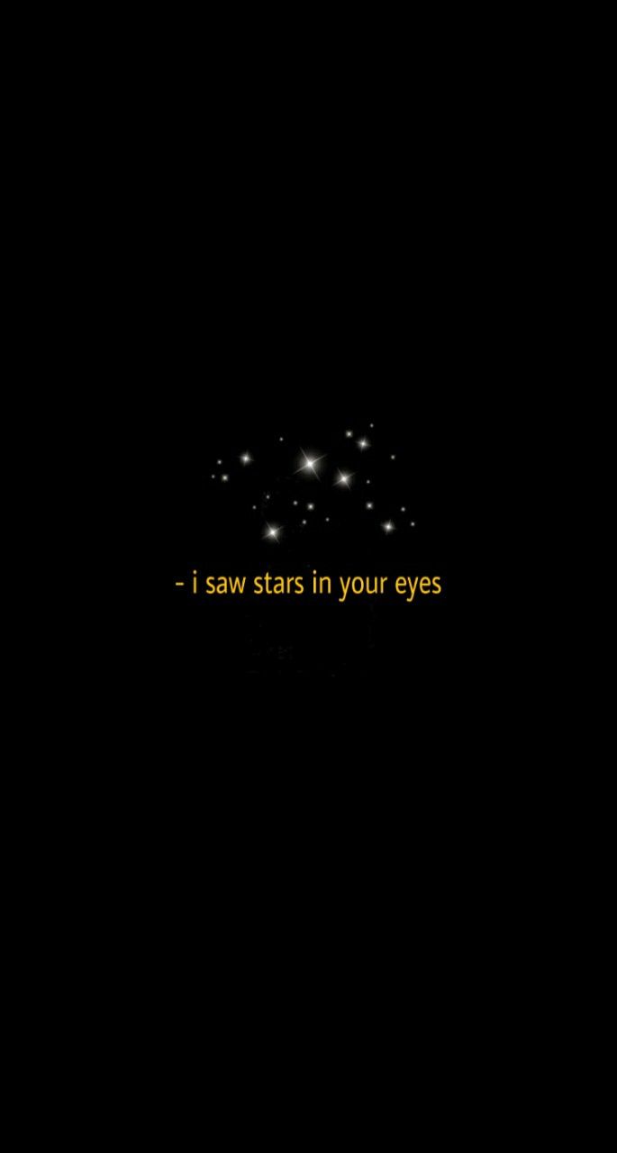 the words i saw stars in your eyes are lit up against a black background with yellow lettering