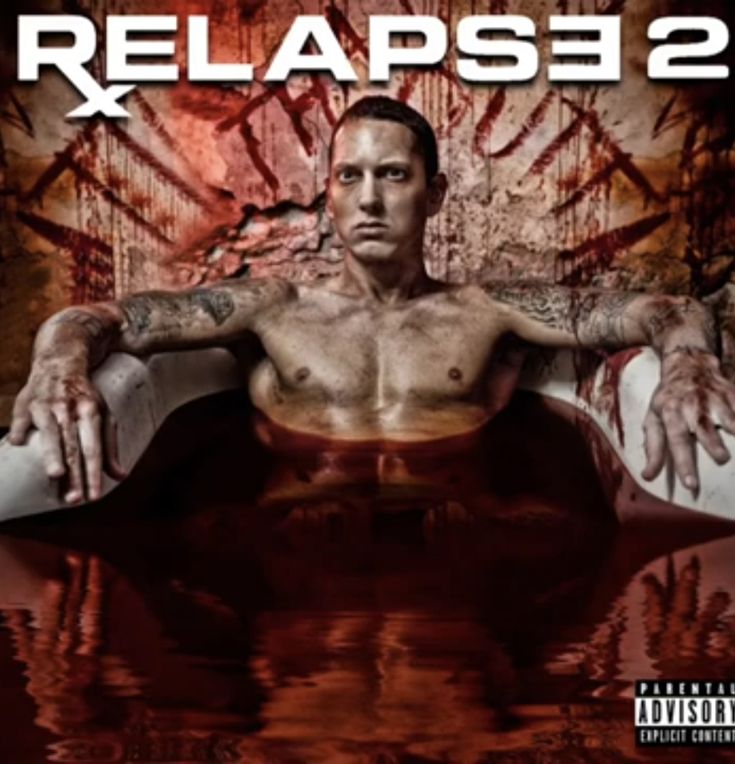 a man sitting on top of a couch in front of a blood covered wall with the words relapse 2