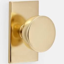 an image of a golden door handle on a white background