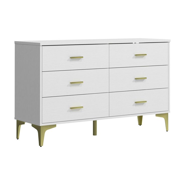 a white dresser with four drawers and two gold handles on each drawer, against a white background