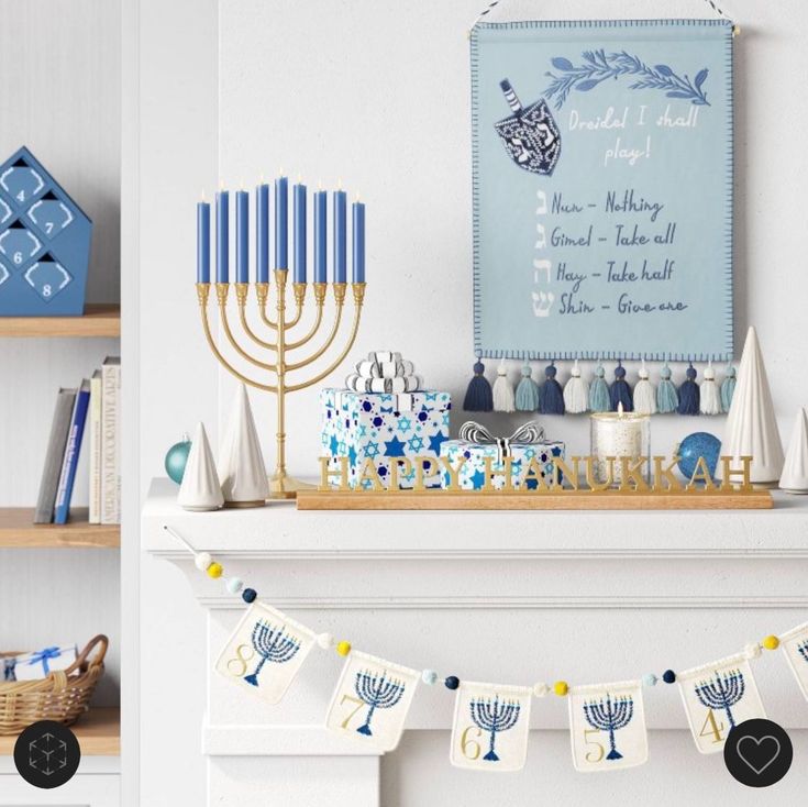 a hanukkah menorah banner is hanging on the mantle