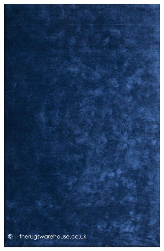 a blue area rug that is very soft