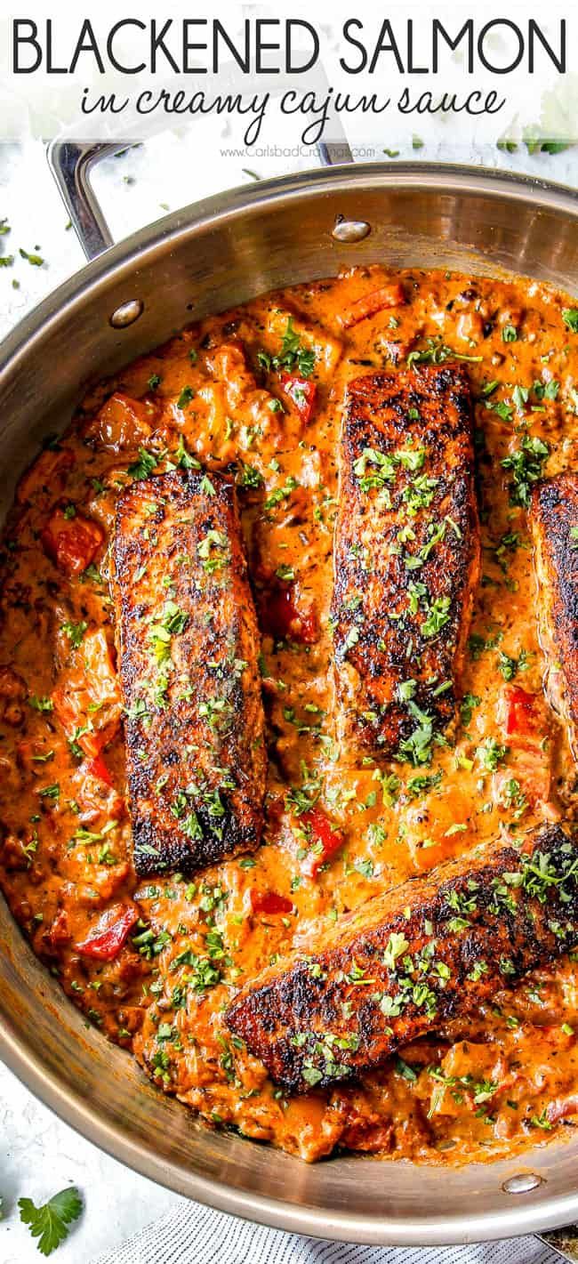 blackened salmon in creamy tomato sauce with parsley on the side and text overlay that reads, blackened salmon in creamy tomato sauce