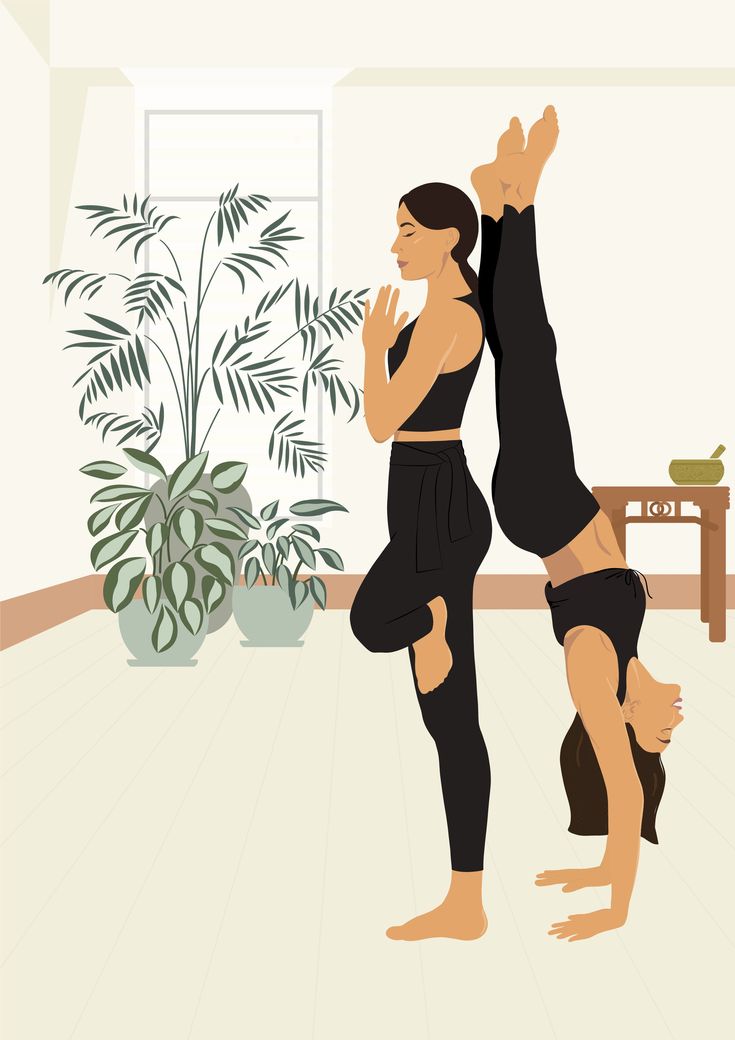 two women doing yoga in front of a potted plant