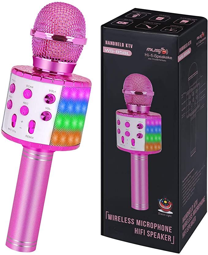 a pink microphone next to a box for the wireless microphone hi - fi speaker