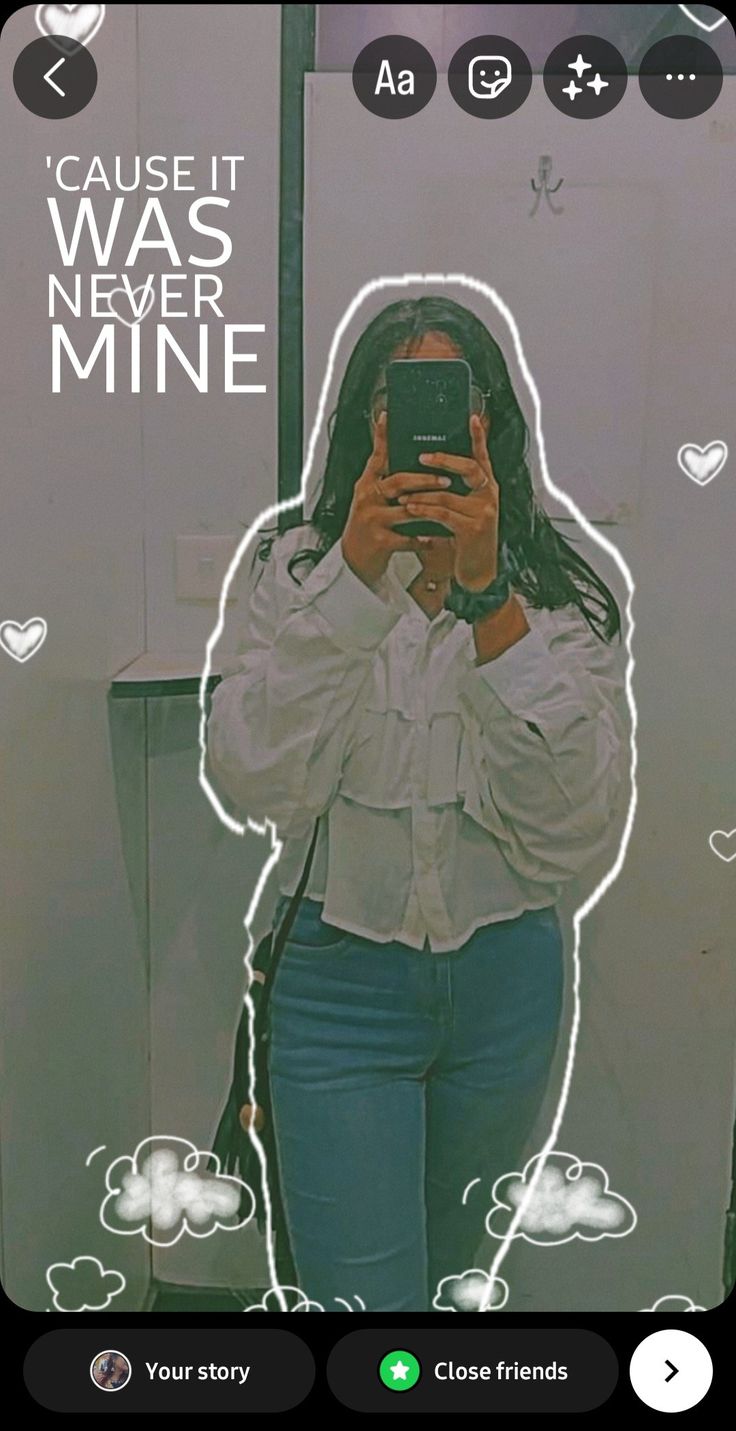 a woman taking a selfie in front of a mirror with the caption cause it was never mine