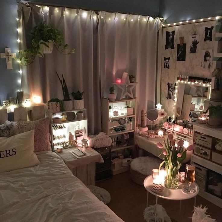 a bedroom with lights and decorations on the walls