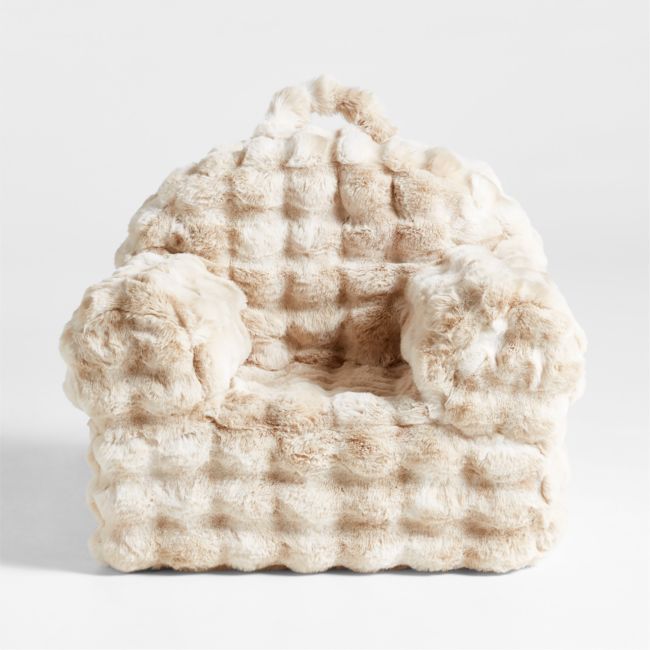 a chair made out of fake fur on a white background