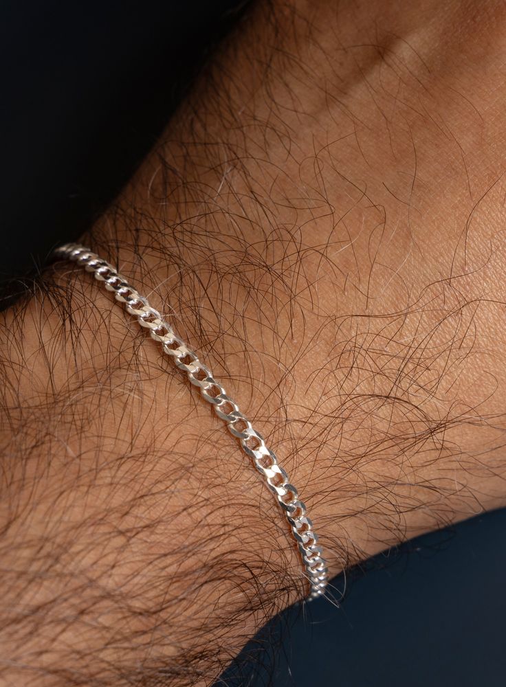 For the UBER MINIMALIST fella, we made this barely there, super lightweight 3mm cuban link chain bracelet. Love this style when paired with a colorful gemstone bead bracelet or with your silver watch. That said, we love it even more when it can have the spotlight and be the only jewelry you are wearing. Less is always more. Material: 925 Sterling Silver Bracelet Width: 3mm Clasp: Lobster Claw Available in 7, 8, 9 inches. If you need a custom or in-between size feel free to contact us to arrange Male Bracelets Aesthetic, Men Silver Bracelet Simple, Sliver Braslate Men, Male Accessories Aesthetic, Male Jewelry Aesthetic, Mens Jewelry Aesthetic, Bracelet For Guys, Mens Jewelry Bracelet Silver, Men Silver Bracelet