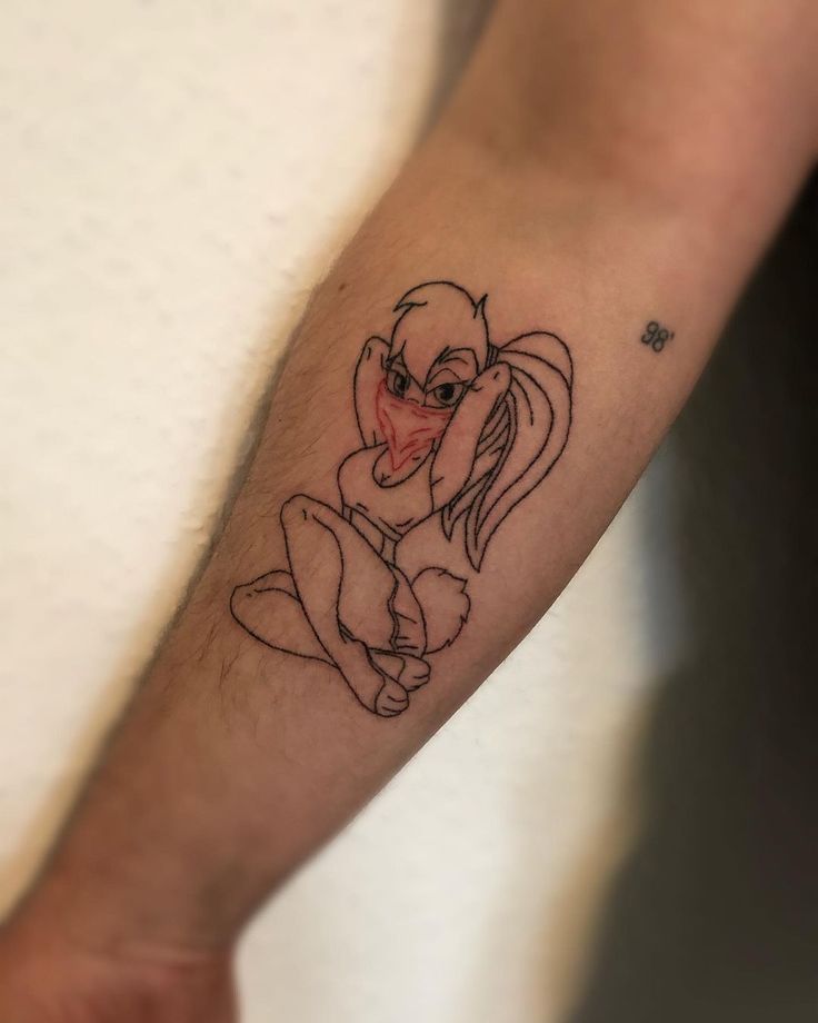 a tattoo on the arm of a person with a small bird in it's hand