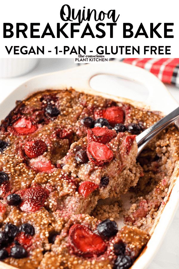 a close up of a plate of breakfast bake with berries and granola on top