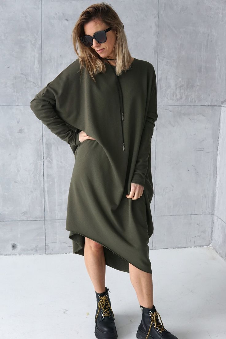 "Be relaxed, free and safe in this khaki oversized dress. Unique oversized tunic dress, made of cotton Italian jersey. Wear it even as a long top or dress. It's extremely versatile. The dress has long sleeves. The dress has hidden pockets in the side seam. the dress bottom with raw ends. It's the season-less statement piece you have been looking for. The dress is made of high-quality jersey and makes it a perfect casual wear. DIDRESS is part of the slow fashion movement. All our products are cra Casual Oversized Dress With Curved Hem, Asymmetrical Sweatshirt, Oversized Tunic Dress, Modern Dresses, Green Sweater Dress, Maternity Long Dress, Sweater Dress Oversized, Oversized Tunic, Oversized Dress