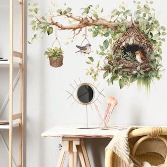 there is a bird's nest on the wall next to a table and chair